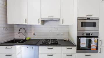 Apartment, 2 Bedrooms | Private kitchen | Full-sized fridge, microwave, oven, stovetop