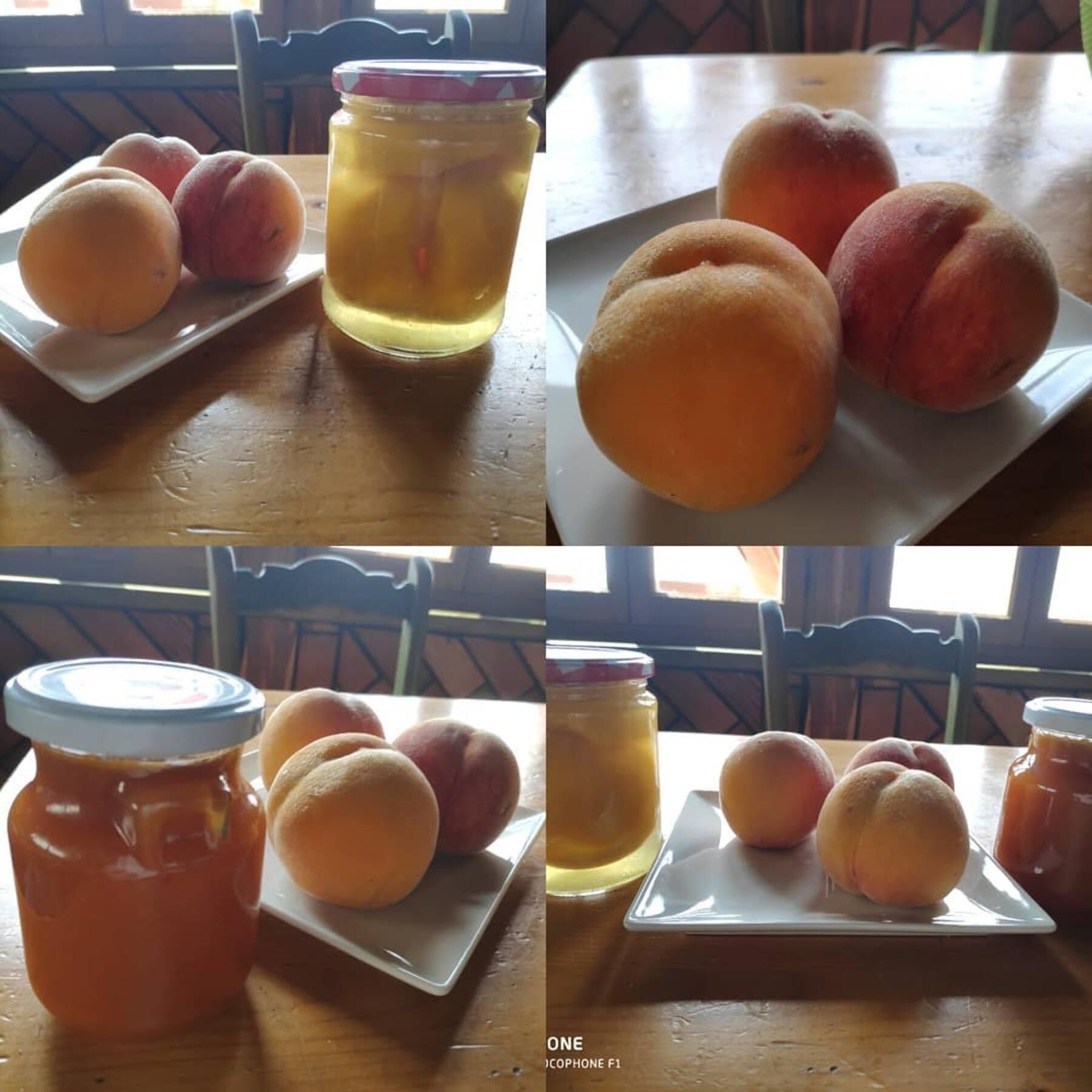 A wooden table with a plate of peaches and a jar of peach preserves.