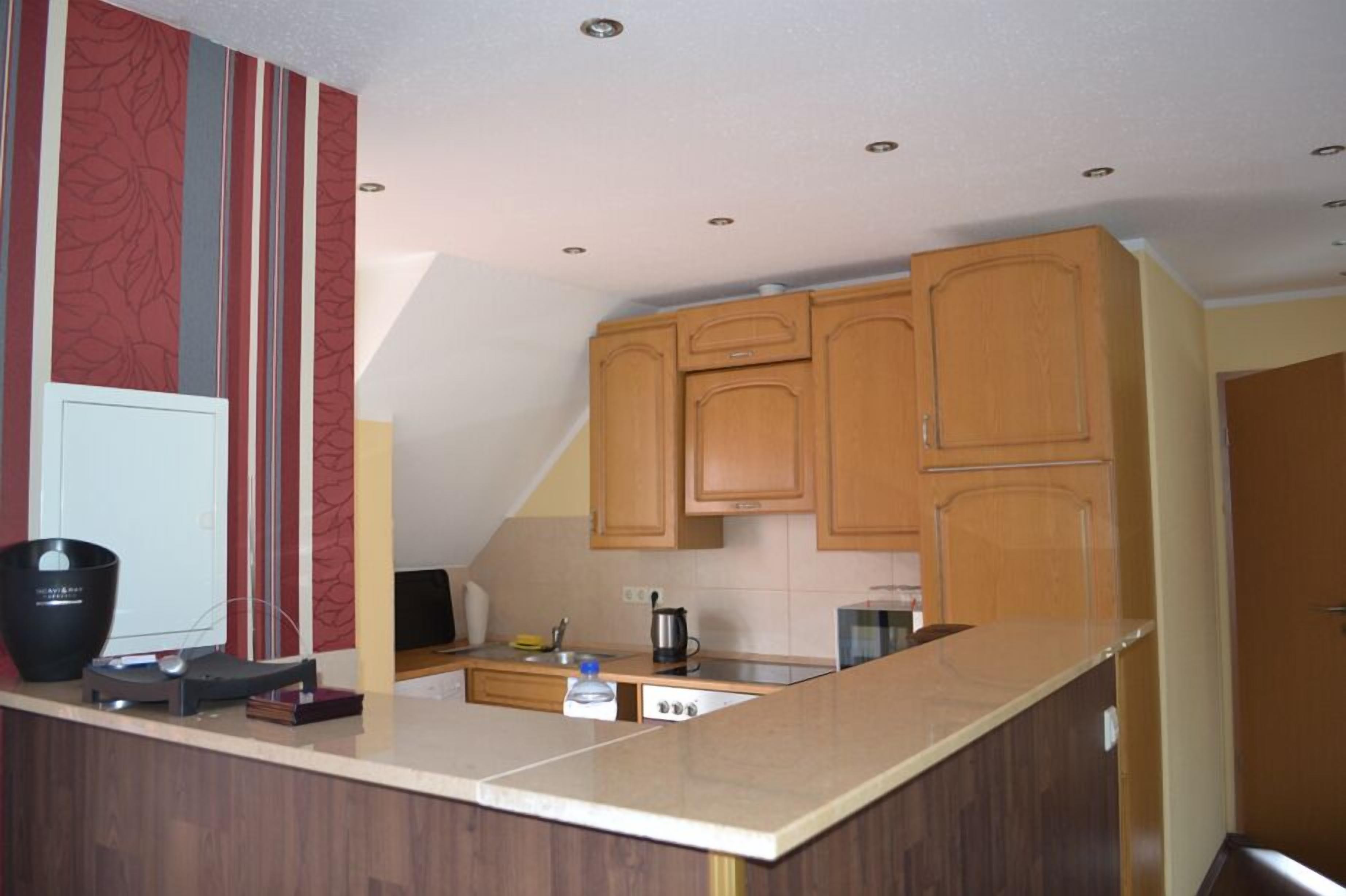 Apartment | Private kitchen | Full-size fridge, microwave, oven, stovetop