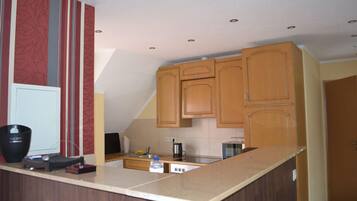 Apartment | Private kitchen | Full-size fridge, microwave, oven, stovetop