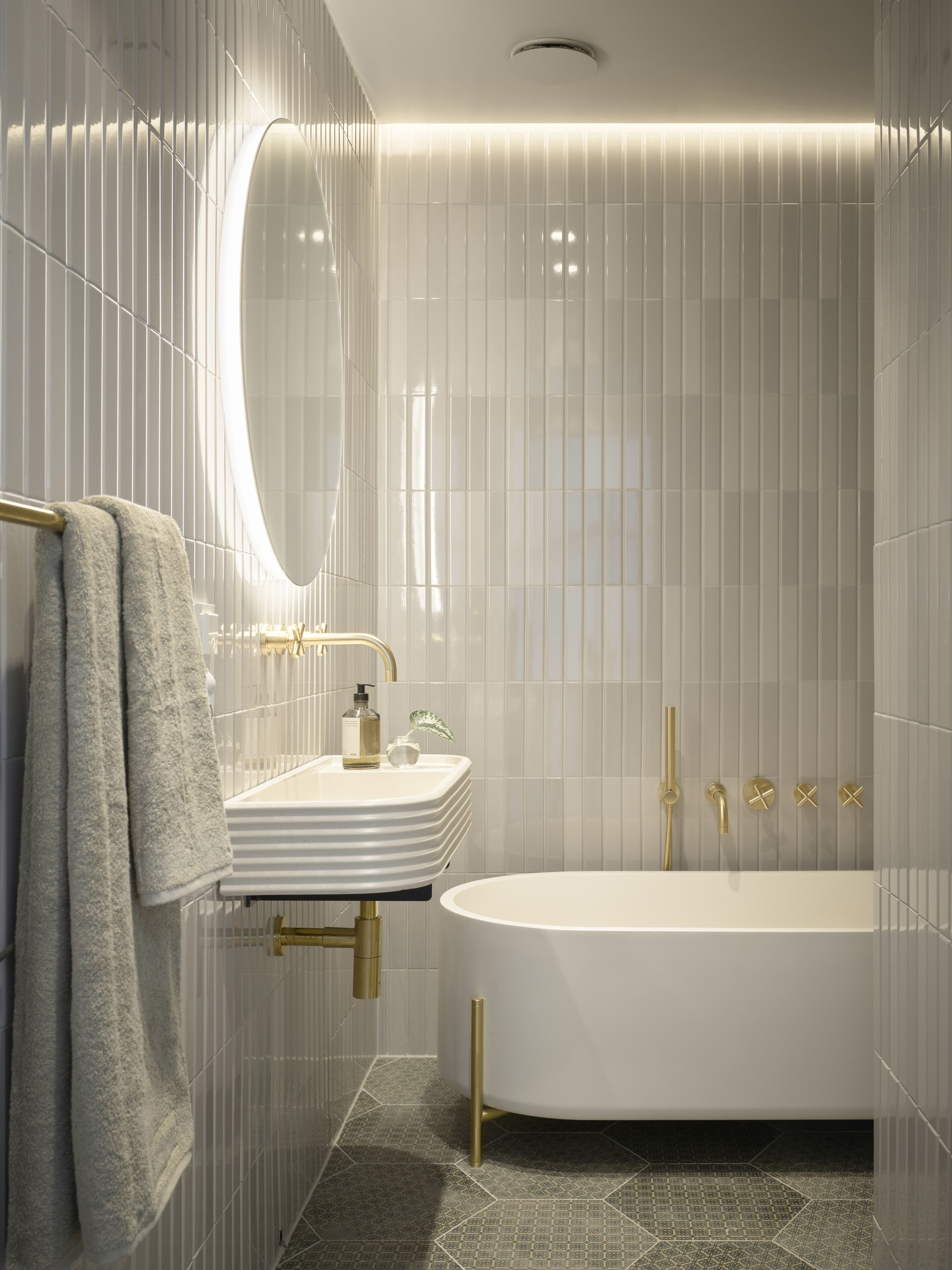 deluxe double room | bathroom | hair dryer, heated floors, towels, soap