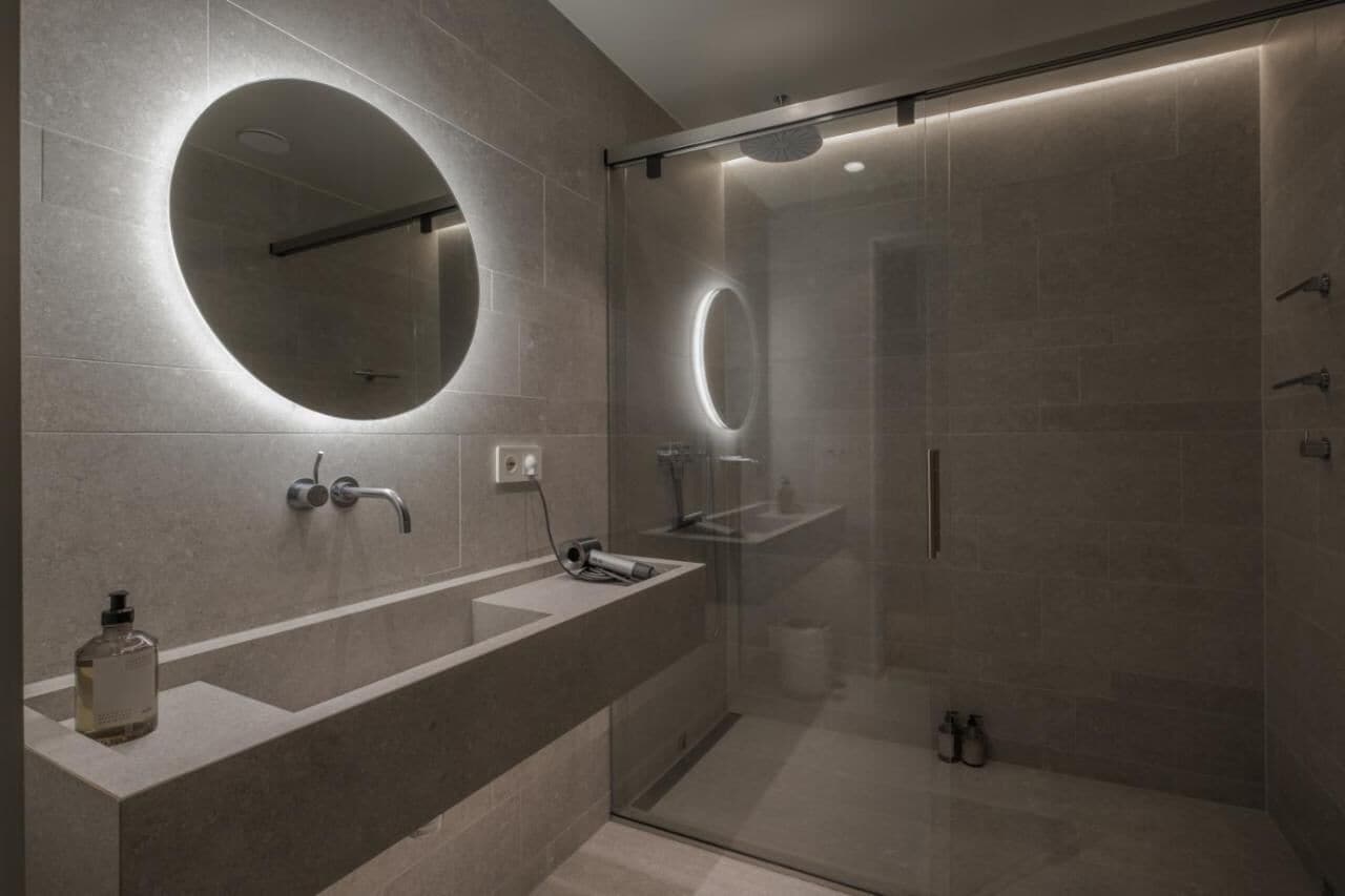 junior suite | bathroom | hair dryer, heated floors, towels, soap