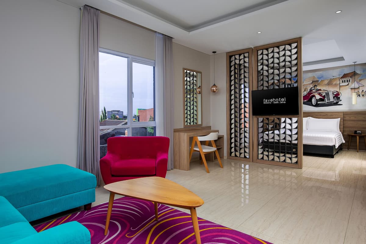 Habitación (fabroom plus) | Área de sala de estar | Televisión