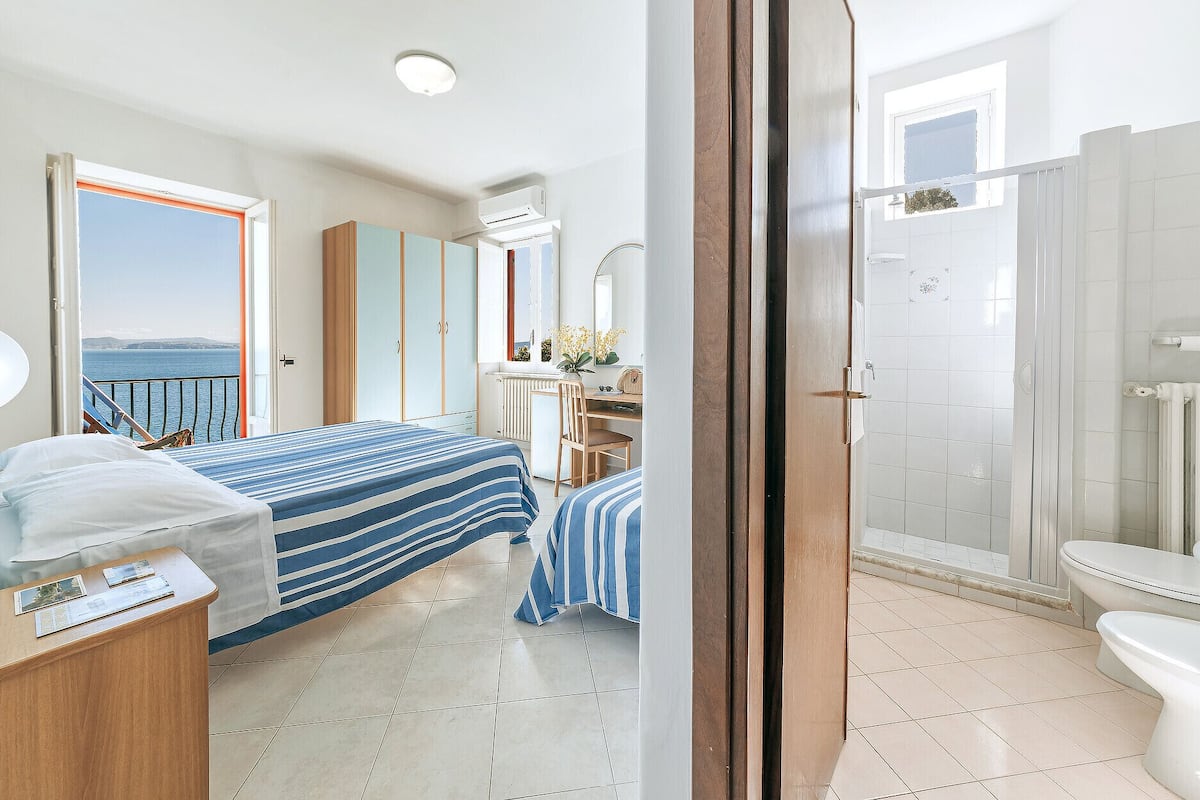 triple room, sea view | 1 bedroom, minibar, desk, free wifi