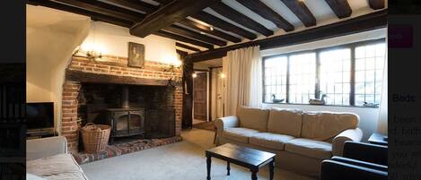 Casa, varias camas, para no fumadores | Sala de estar | Televisión de pantalla plana y chimenea