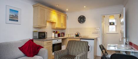 Apartment, 1 Double Bed with Sofa bed, Non Smoking | Living area | Flat-screen TV