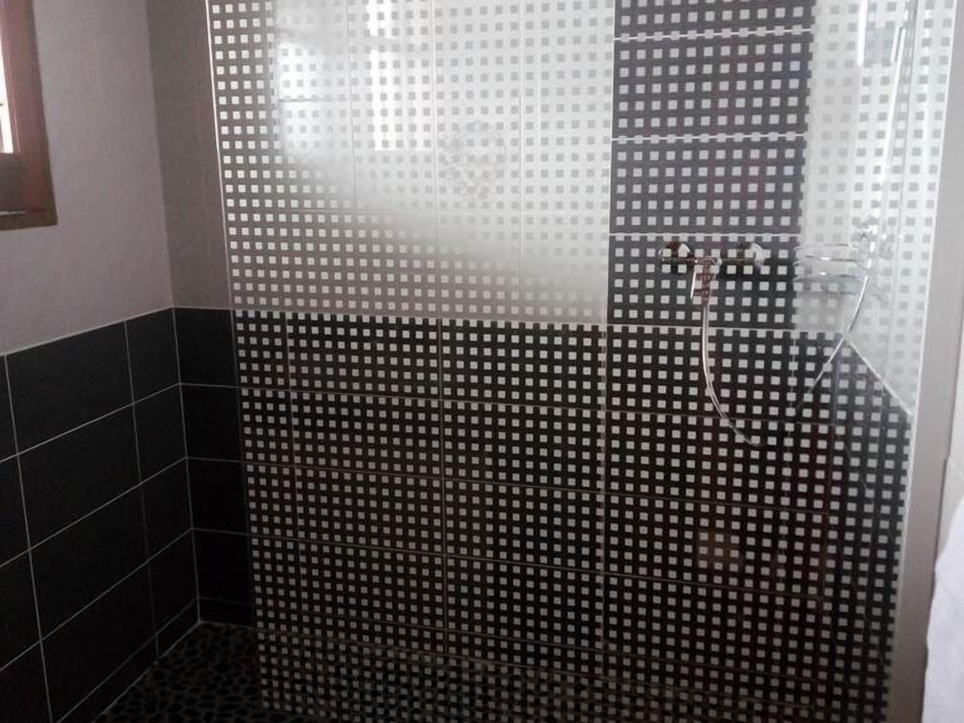 premium room, 1 king bed, non smoking | bathroom shower