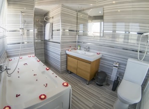Deluxe Room, 1 Double Bed, Sea View, Overwater | Bathroom | Shower, free toiletries, hair dryer, slippers