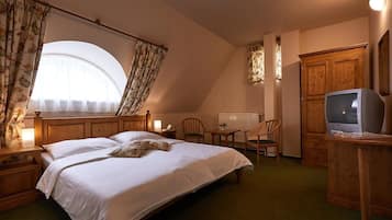 Desk, blackout curtains, iron/ironing board, rollaway beds