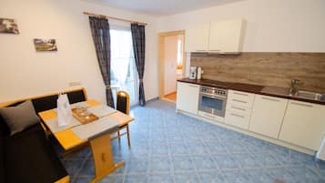 Apartment (Panorama TOP 2) | Living area | Flat-screen TV