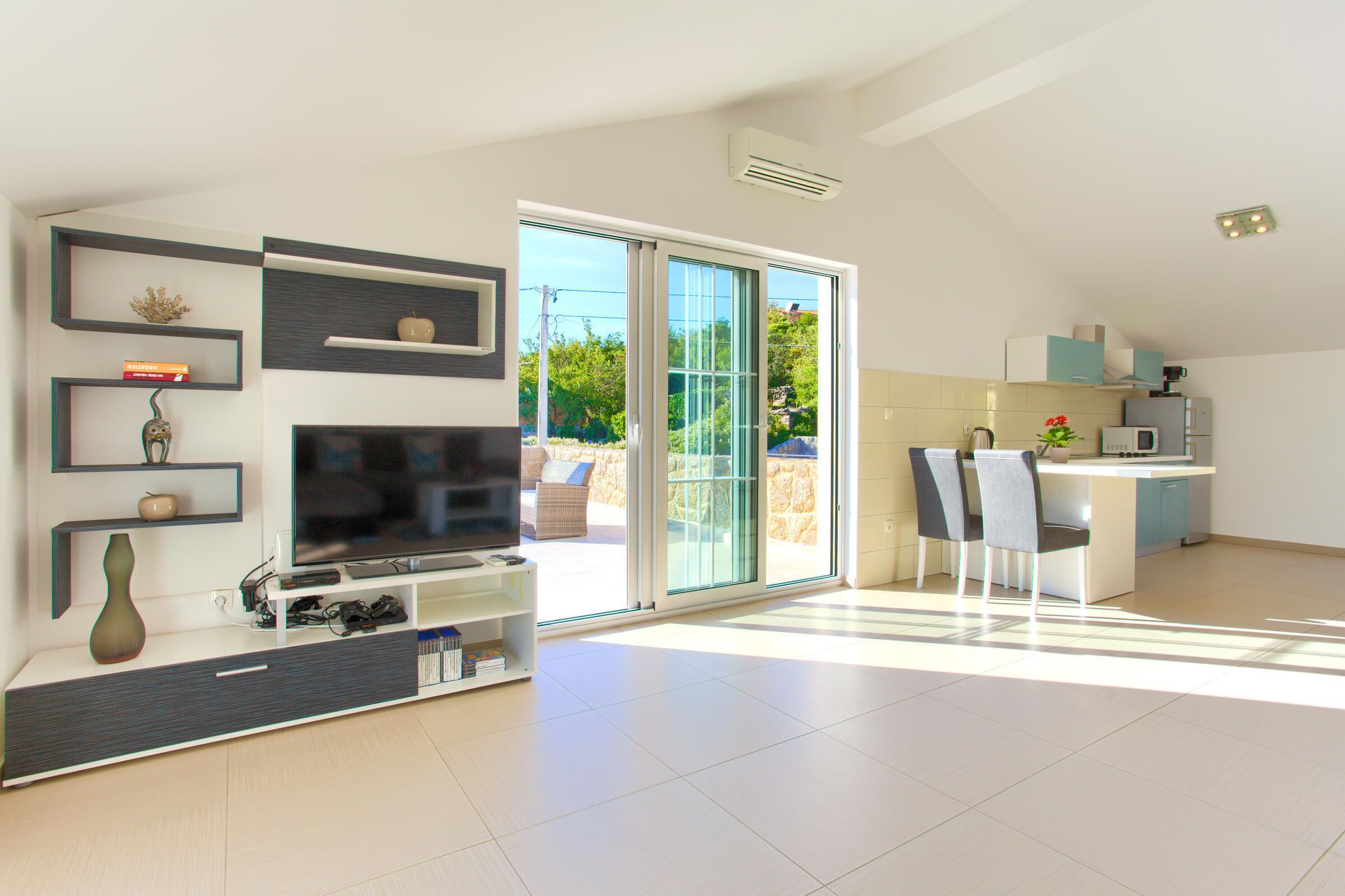 Villa | Living area | Flat-screen TV, DVD player