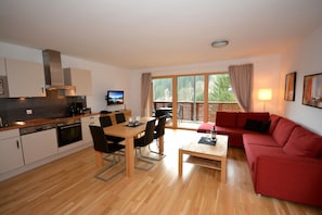 Apartamento, 2 habitaciones (Schmitten Finest Apartments - SKYBLUE) | Sala de estar | Una televisión de pantalla plana