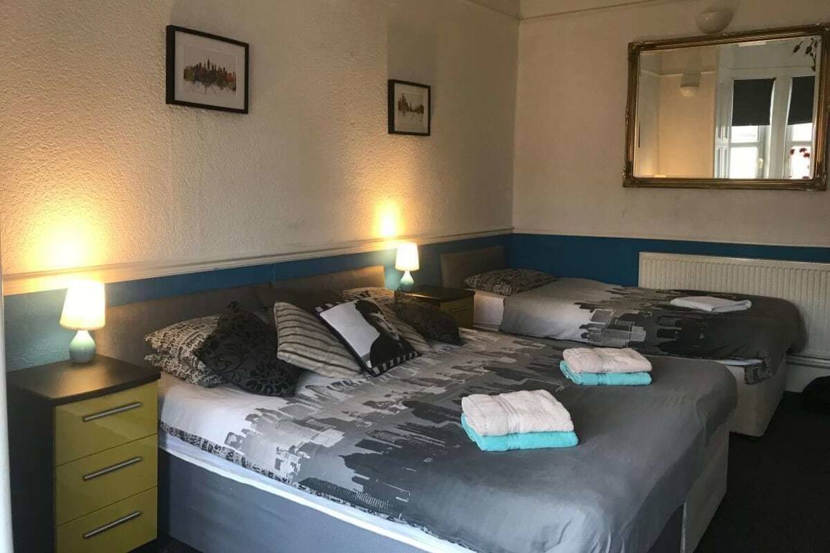 Familiekamer, privébadkamer | Een strijkplank/strijkijzer, gratis wifi, beddengoed