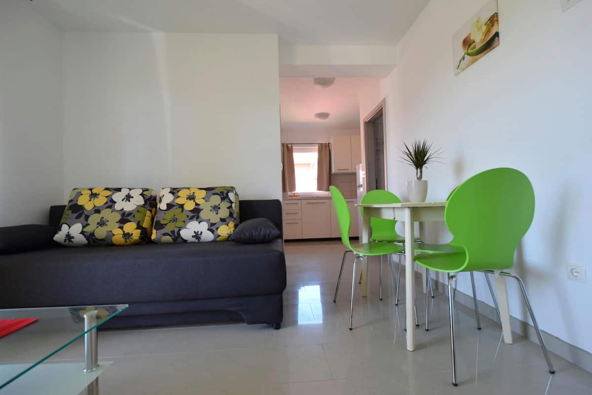 Apartment, Balcony | Living area | Flat-screen TV