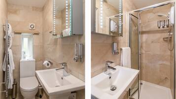 Kahden hengen huone, kylpyhuone makuuhuoneen yhteydessä, näköala puutarhaan