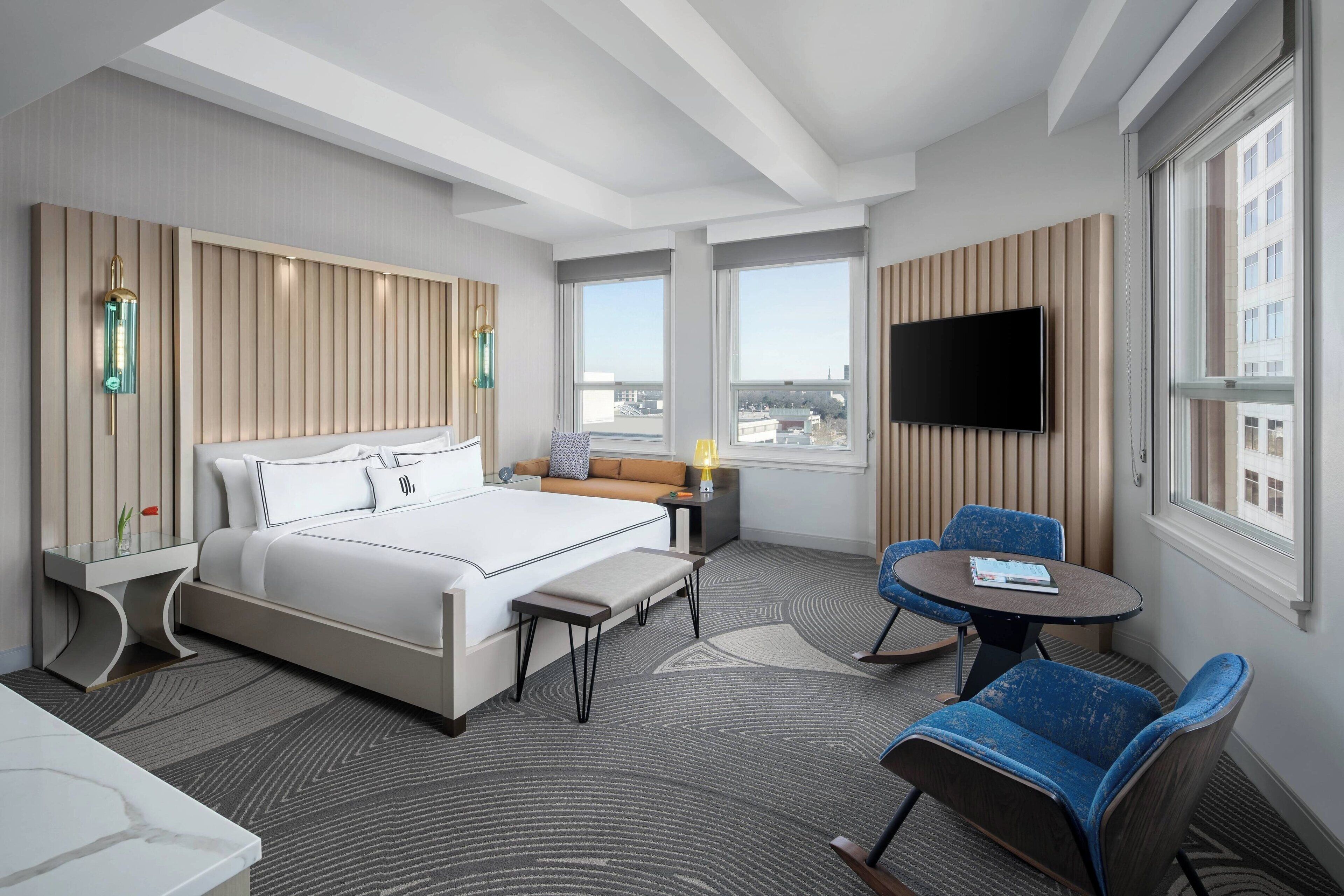 deluxe room, 1 king bed, city view, corner | premium bedding, in-room safe, desk, blackout curtains