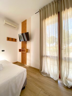 Quarto conforto | Edredons de pluma, Wi-Fi de cortesia, roupa de cama