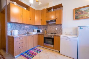 Leilighet, 2 soverom | Eget kjøkken | Kjøleskap, ovn, kokeplater og kaffetrakter/tekoker