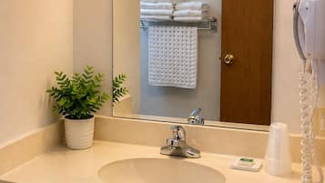 Ducha y bañera combinadas y toallas