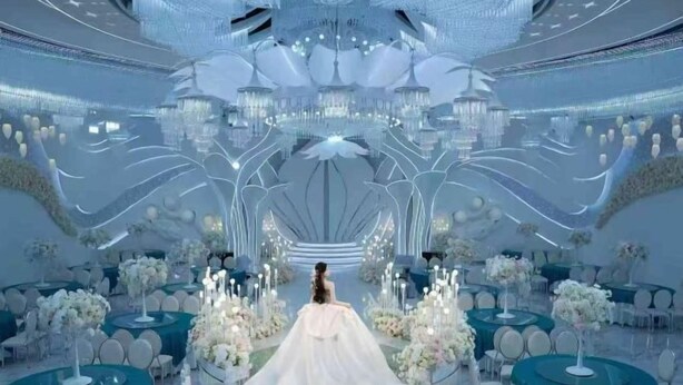 A futuristic venue with a central aisle, white floral arrangements, and a reflective floor. - Jin Li Hua Grand Hotel (Shaodong)