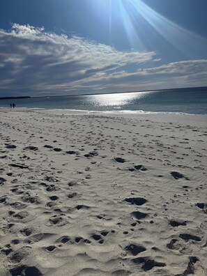 On the beach, sun-loungers