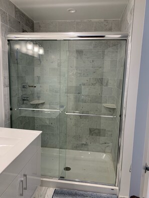 Bathtub, hair dryer, towels