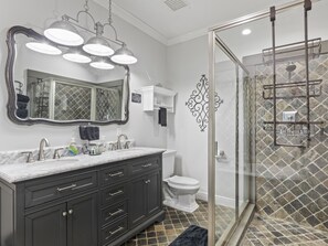 Combined shower/tub, hair dryer, towels, soap