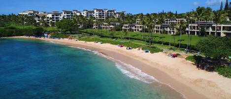 On the beach, sun loungers, beach towels