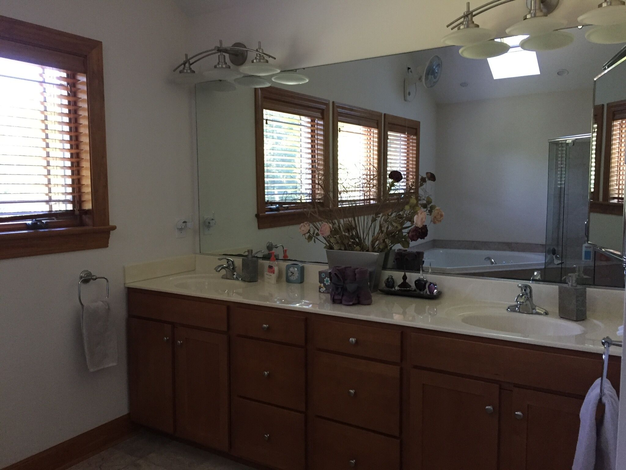 “West Coast”: 5 bedroom home with pool in an upscale neighborhood.