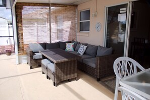 Outdoor dining - Cozy 4 bedroom 2 bathroom Pool Home with game room Close to all the parks. (Clermont)