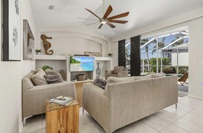 Una televisión, una mesa de tenis de mesa, un reproductor estéreo