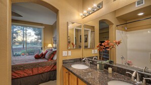 A bathroom with two sinks, a large mirror, and a shower. - SL Lakes Condo w/GOLF VIEWS, Gated Comm w/Htd POOL &Spa, Walk to Mall w/Eats & Theater (Mesa)