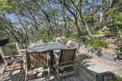 Beach House set amongst the trees and short walk to all amenities.