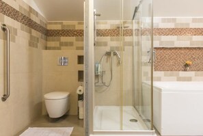 Combined shower/tub, hair dryer, bathrobes, towels
