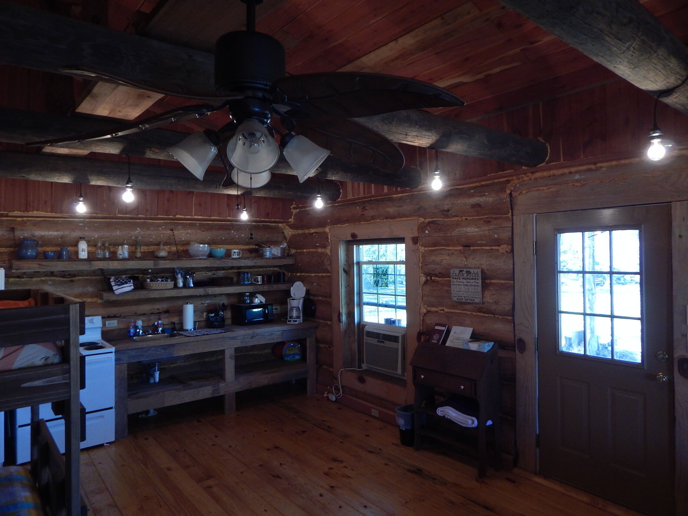 Rustic Log Cabin with fishing.