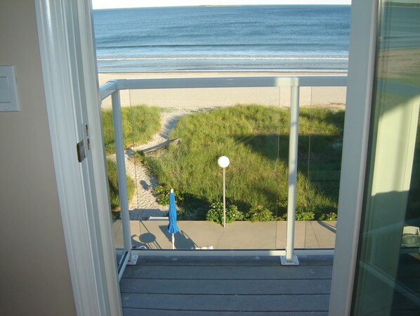A balcony with a view of the beach and ocean. - Panoramic Views & Crashing Waves (Old Orchard Beach)