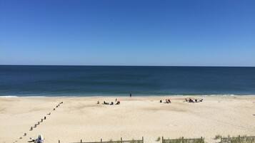 On the beach, sun loungers