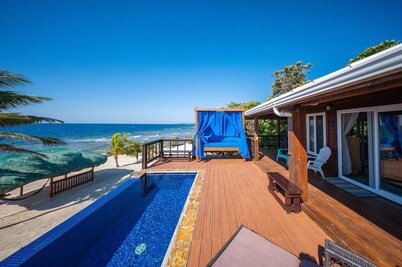 Coral Beach Retreat – Private Beachfront Escape