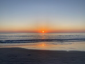 On the beach, sun-loungers, beach towels