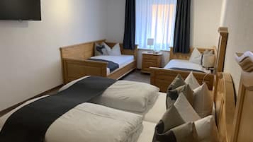 Standard Quadruple Room | Premium bedding, memory foam beds, desk, laptop workspace