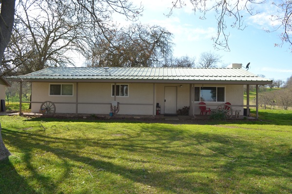 Bathroom is located in the hallway