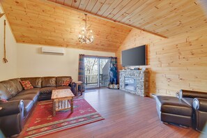 TV, fireplace, books, stereo