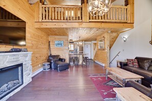 TV, fireplace, books, stereo