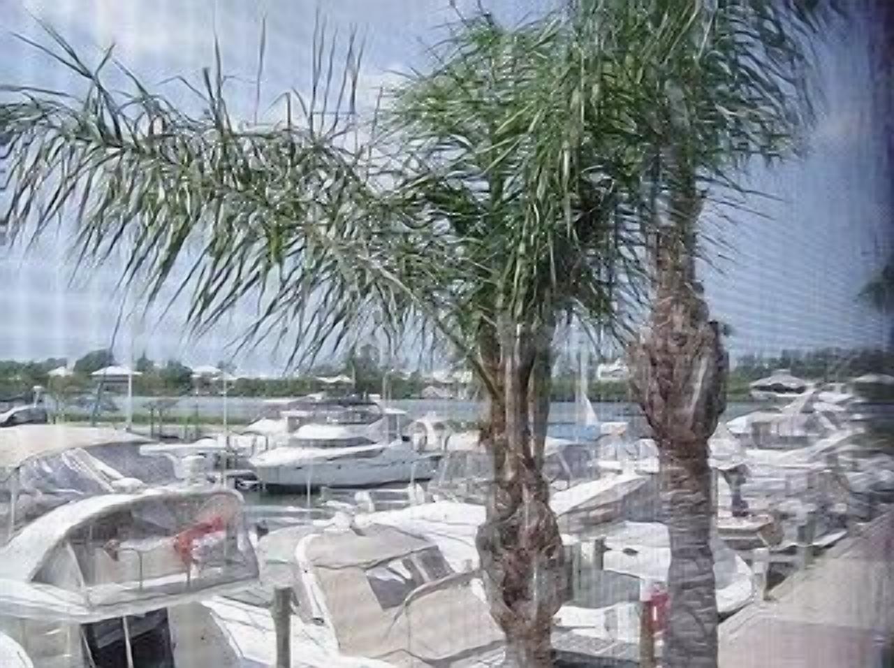 Harborfront Condo (only 26)PRIVATE sandy beach! View boat activity from lanai.