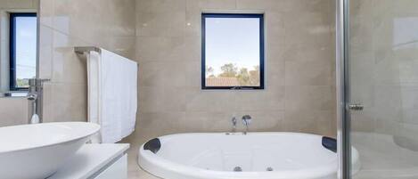Bathtub, hair dryer, towels
