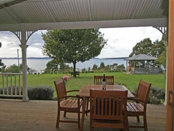 Outdoor dining - Wavestation Farmhouse, Southern Tasmania. <br>Views to Bruny Island (Middleton)