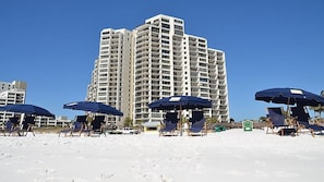 On the beach, sun-loungers, beach umbrellas