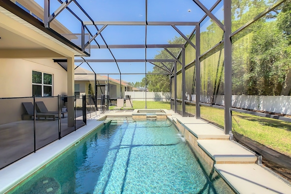 Screened back yard with Pool and Spa