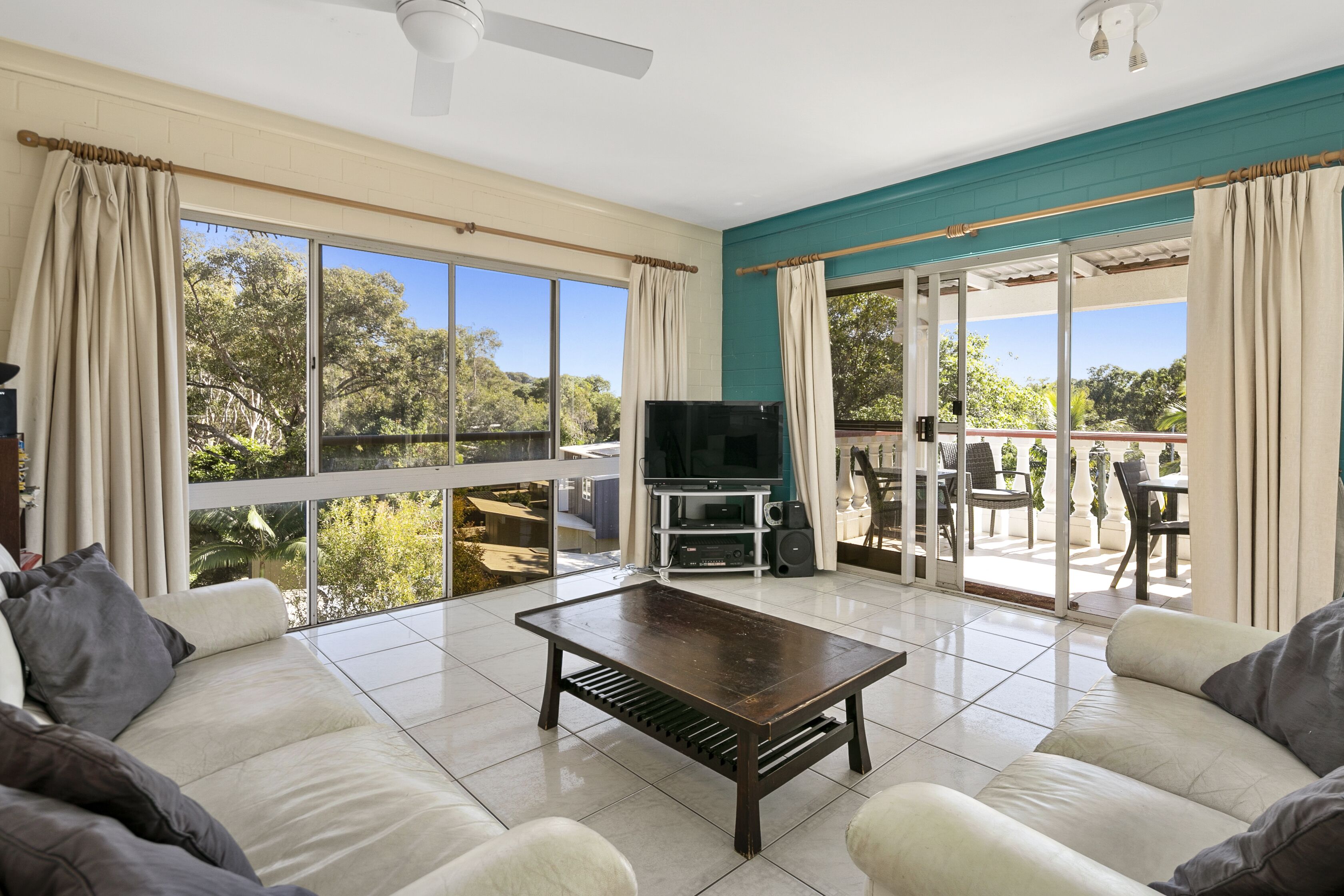 Two bedroom top level unit across the road from Home Beach.