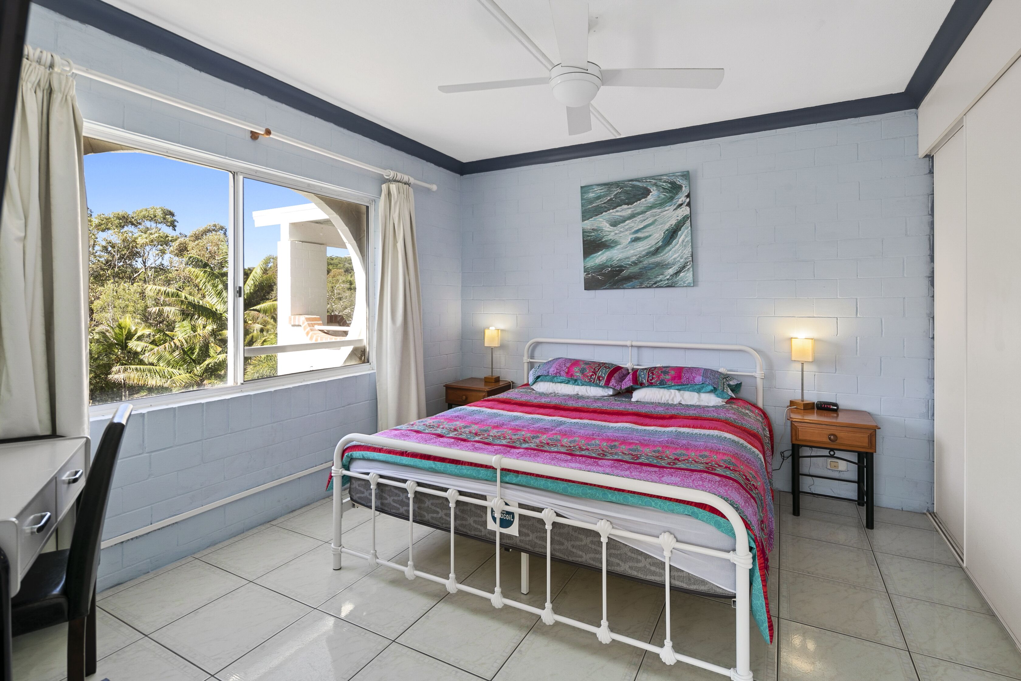 Two bedroom top level unit across the road from Home Beach.